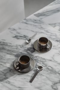Kaboompics - Arabescato Marble Table - Metal Coffee Cup
