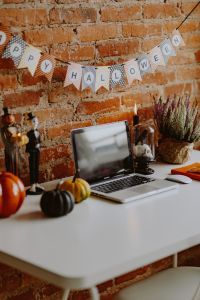 Desk with laptop & Halloween Decorations