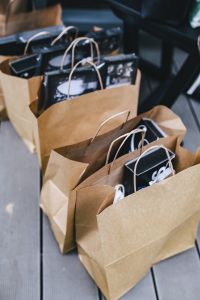 Brown paper shopping bags full of decorations