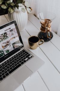 Kaboompics - Apple MacBook & Coffee on the white desk