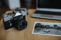 Kaboompics - Old Zenit camera with a laptop and a black-and-white photo