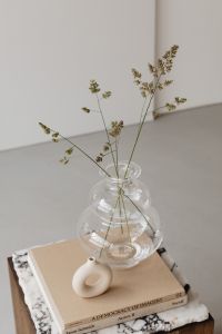 Kaboompics - Ceramic glass vase - side table - walnut wood - marble - books