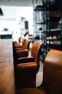 Kaboompics - Row of Leather Dining Chairs Primum - Bent Hansen