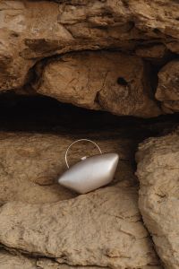 Kaboompics - Minaudière in the shape of a pearl bead