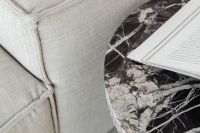 Marble side table - round - greige linen sofa - cement floor