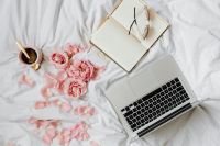 Pink rosses - coffee - laptop - book - glasses