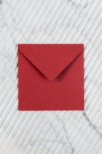 Red envelope on marble