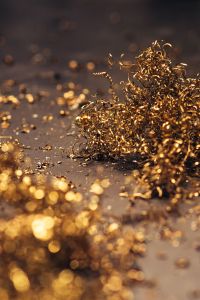 Kaboompics - Close-ups of golden metal shavings on a table