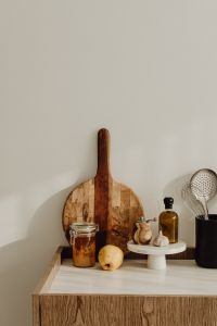 Kaboompics - Honey and spices on kitchen cabinet