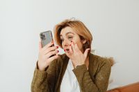 Kaboompics - Woman uses mobile phone
