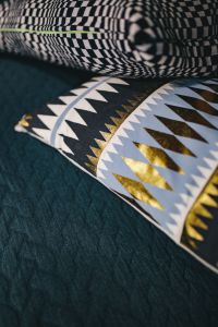 Close-up of pillows on a bed