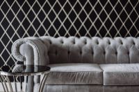 Kaboompics - Elegant grey sofa and a table