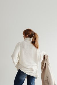 Kaboompics - Woman in white sweater - beige wool jacket - jeans