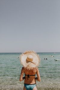 Kaboompics - The woman in the beach hat made of raffia