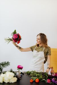 Kaboompics - A beautiful woman florist makes a bouquet