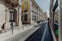 Kaboompics - Famous vintage yellow 28 tram on street of Lisbon, Portugal