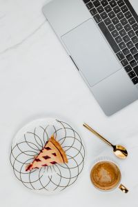 Kaboompics - Fresh baked blueberry pie, cup of coffee & laptop