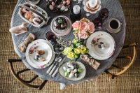 Kaboompics - Round dinner table decorated with easter motifs