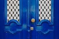 Kaboompics - Colorful wooden door in the facade of a typical Portuguese house at Lisbon, Portugal