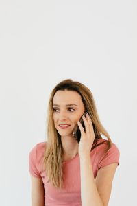 Kaboompics - Young woman talking by mobile phone
